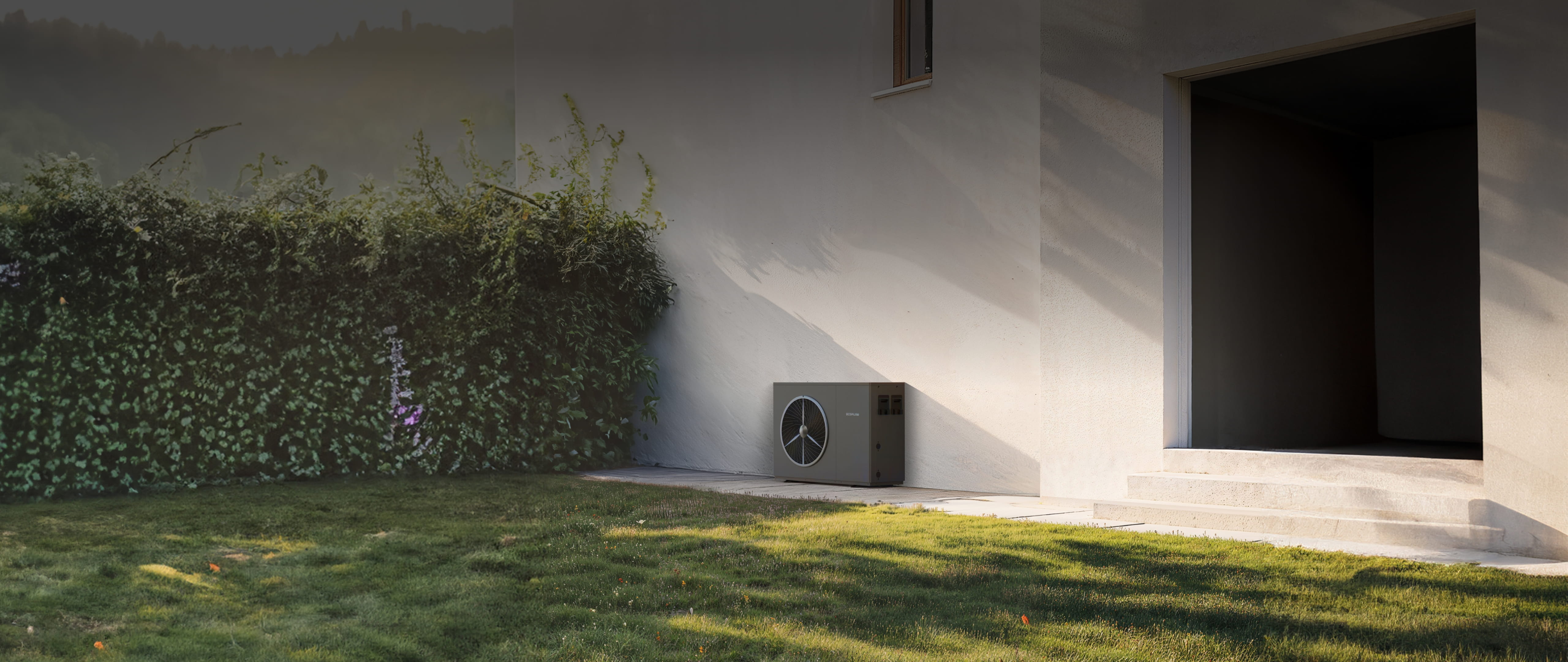 An outdoor unit of a heat pump outside a house