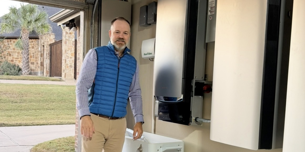 Zack Brantley next to OCEAN Pro 40kWh battery storage setup