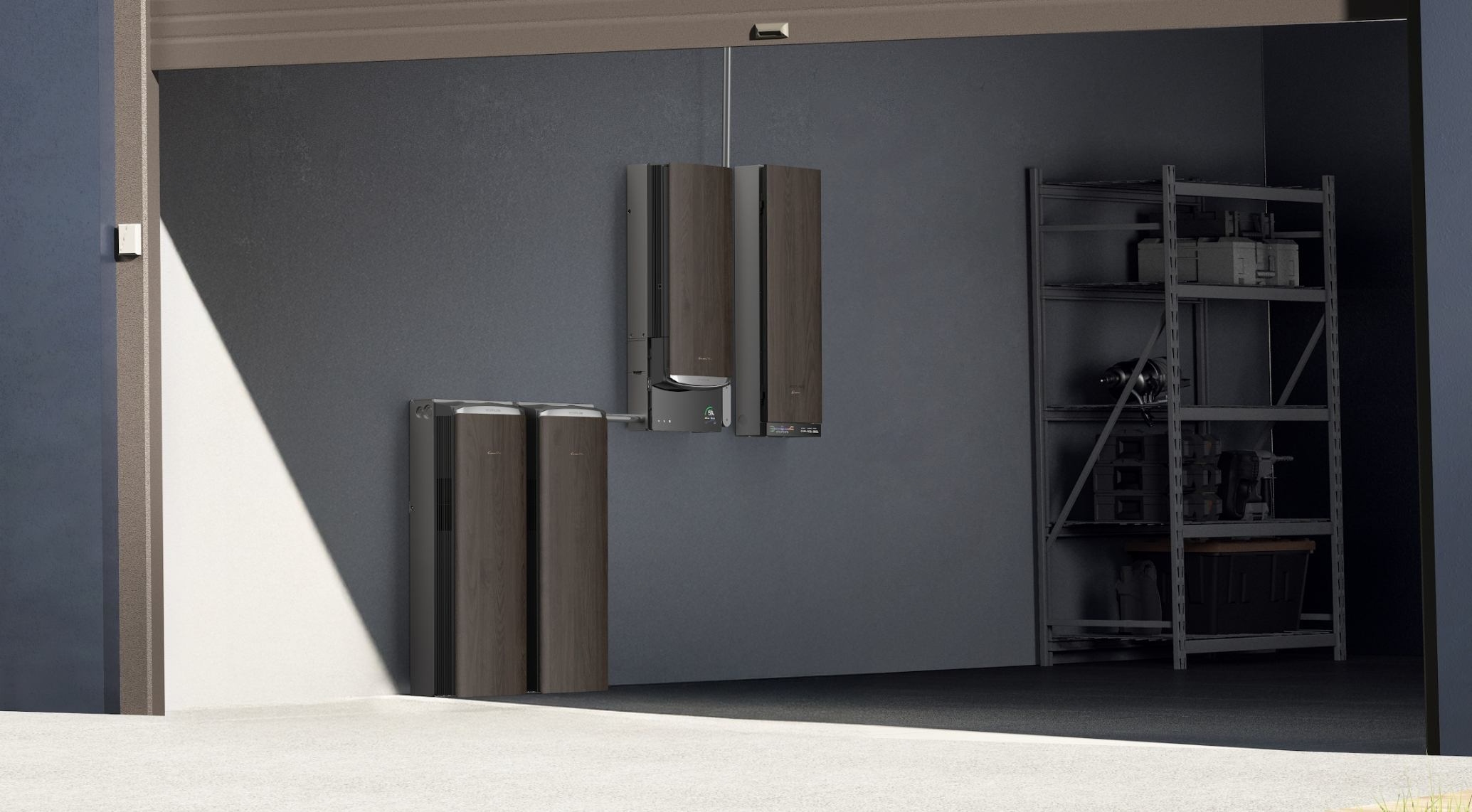 Wood-grain home energy storage units installed on a wall inside a grey garage.