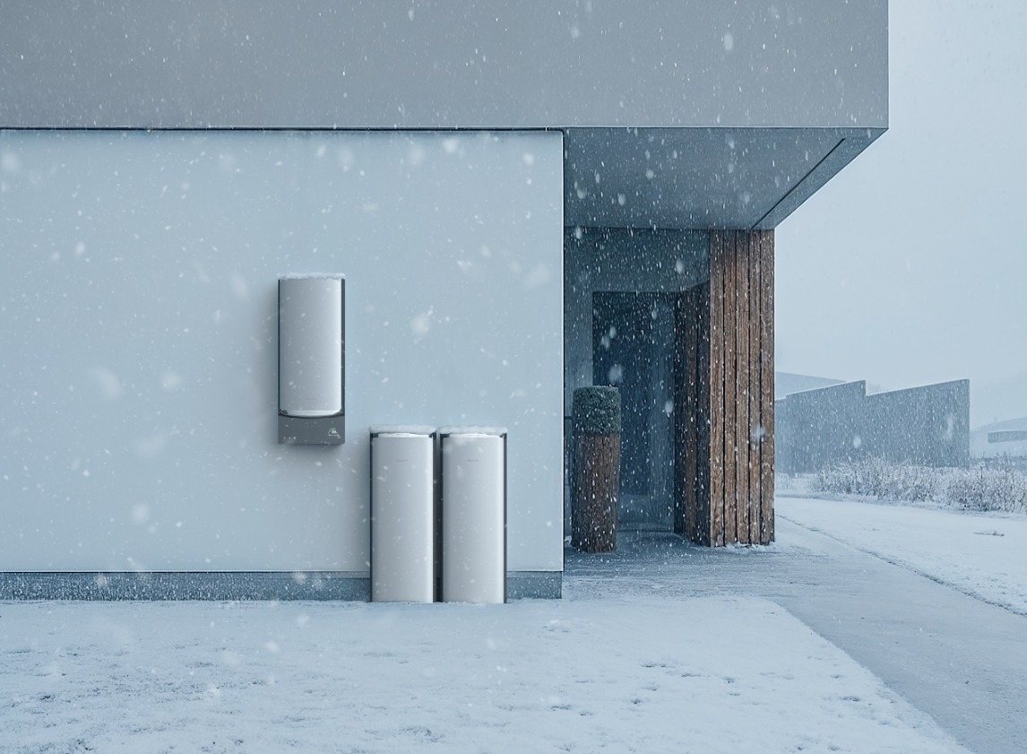 Exterior of a modern, minimalist house during a snowstorm, showing a wall-mounted EcoFlow OCEAN Pro unit and two floor-standing batteries enduring the harsh winter weather.