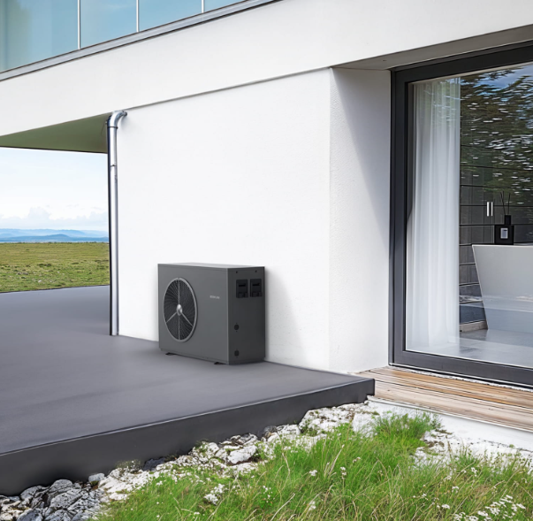 Outdoor heat pump unit installed outside a modern house