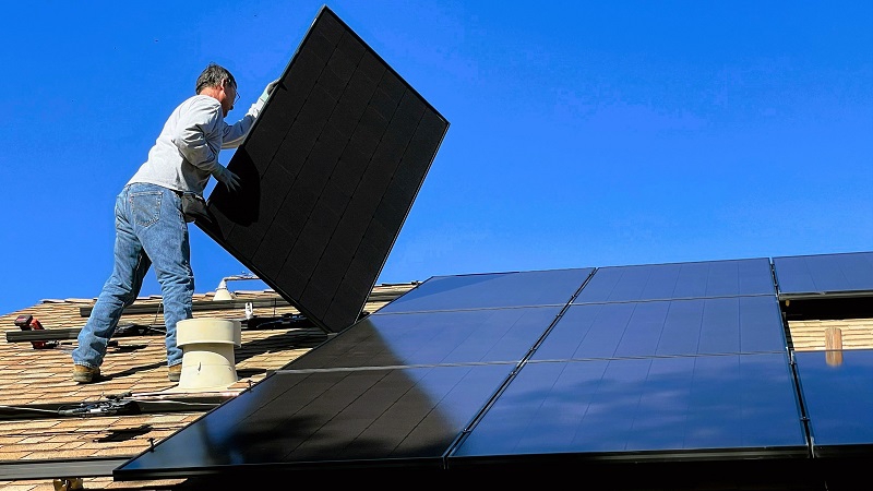 Solar panels being installed by professionals